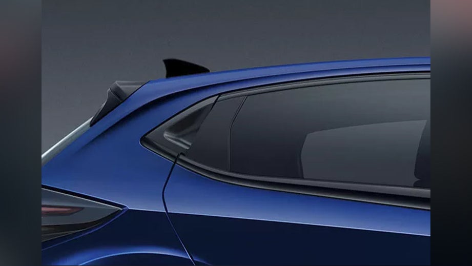 rear side view of a Opera Blue Tata Altroz 2020-2024