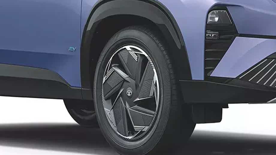 Front wheel and fender close-up of a Tata Curvv EV