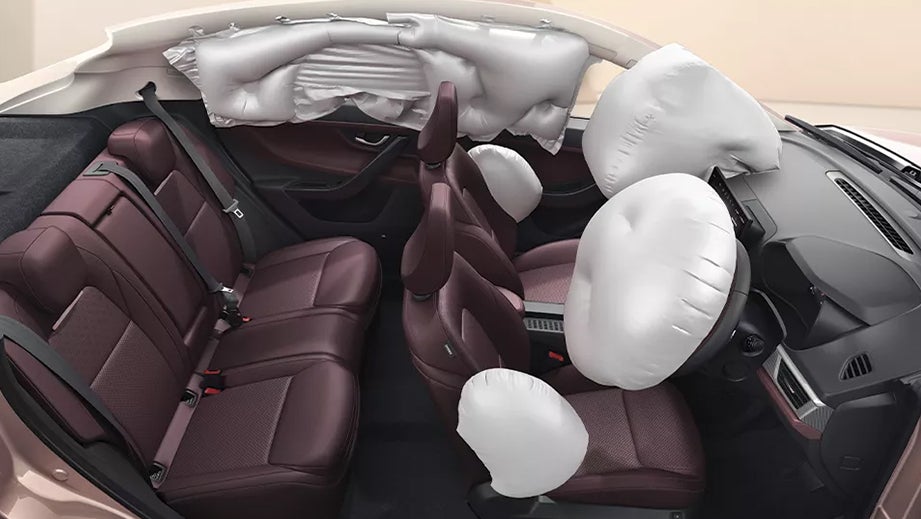 Interior view showing deployed airbags in a Tata Curvv