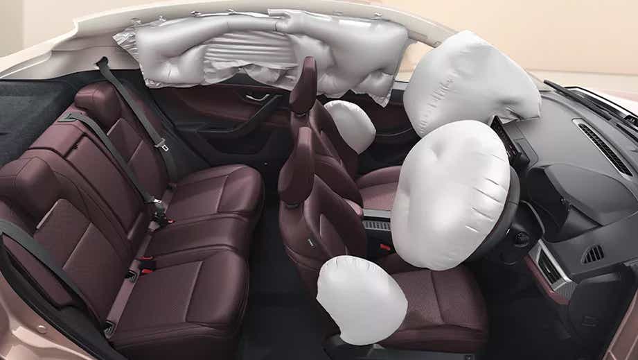 Interior view showing deployed airbags in a Tata Curvv