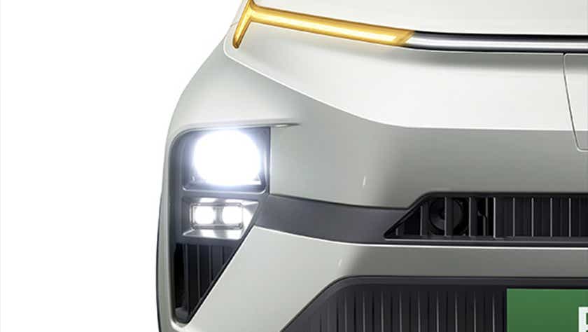 headlight close-up of a Pristine White Dual Tone Tata Punch EV