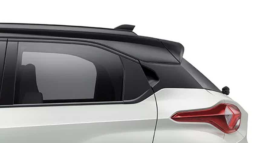 rear three-quarter of a Pristine White Dual Tone Tata Punch EV