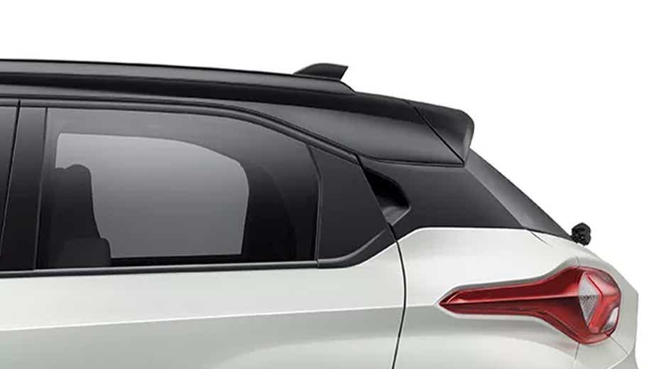 rear three-quarter of a Pristine White Dual Tone Tata Punch EV