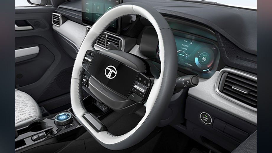 Interior dashboard and steering wheel of a Tata Punch EV