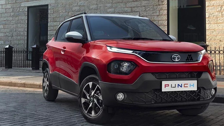 front three-quarter view of a Calypso Red with White Roof Tata Punch