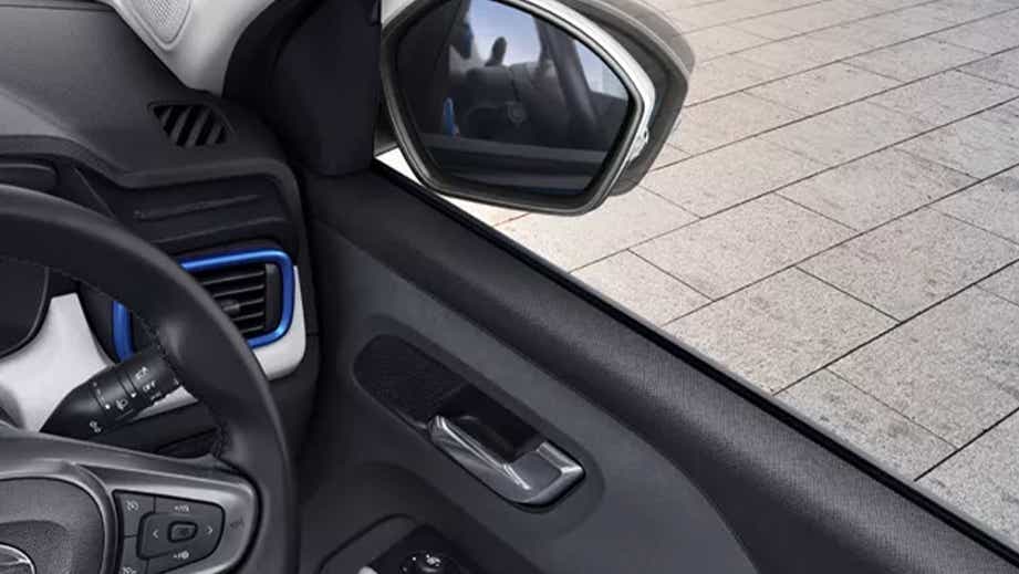 front left interior door and mirror of a Tata Punch