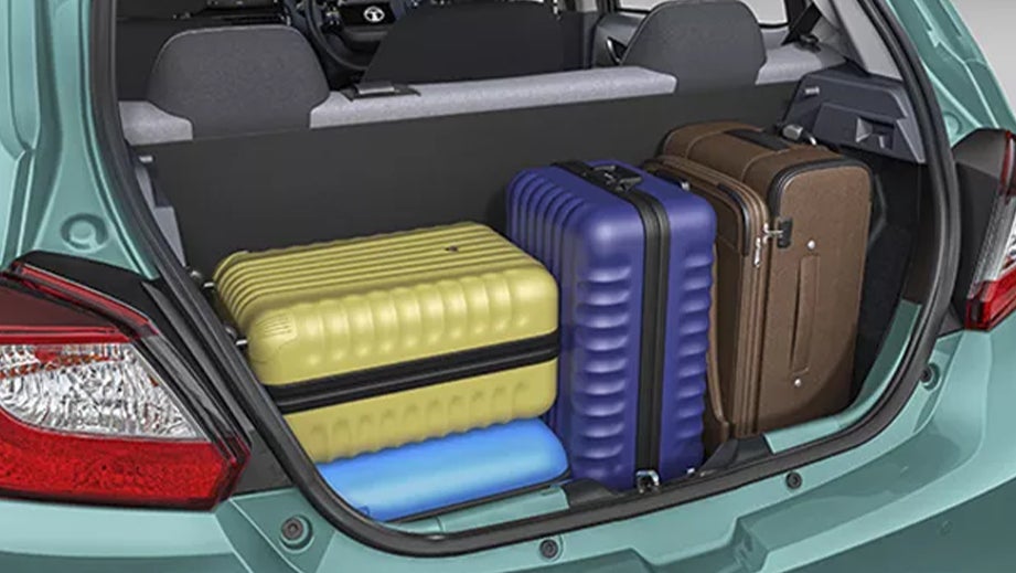 Boot space view of a Tata Tiago showing luggage