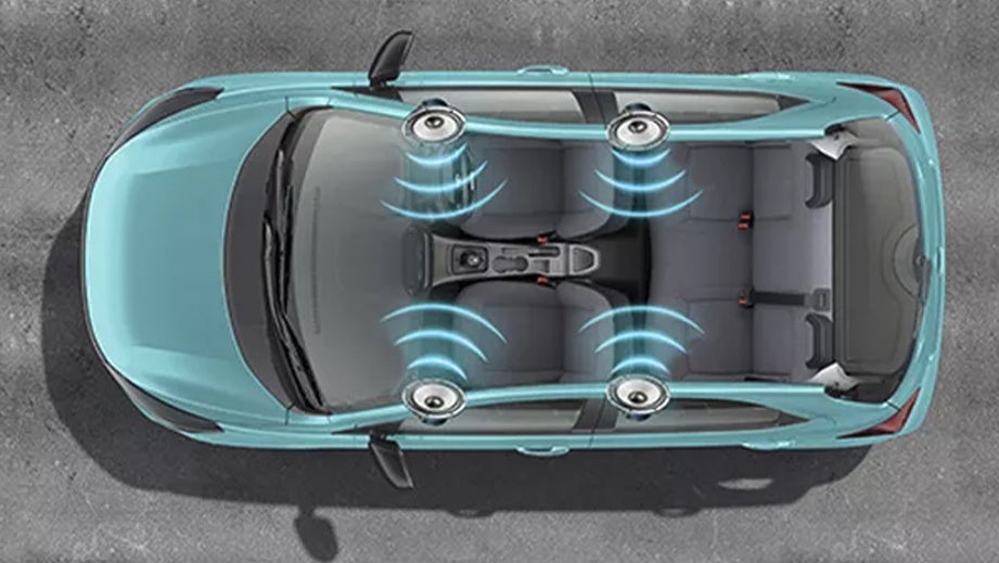 Top view of a Tata Tiago showing the car's interior and speaker placement