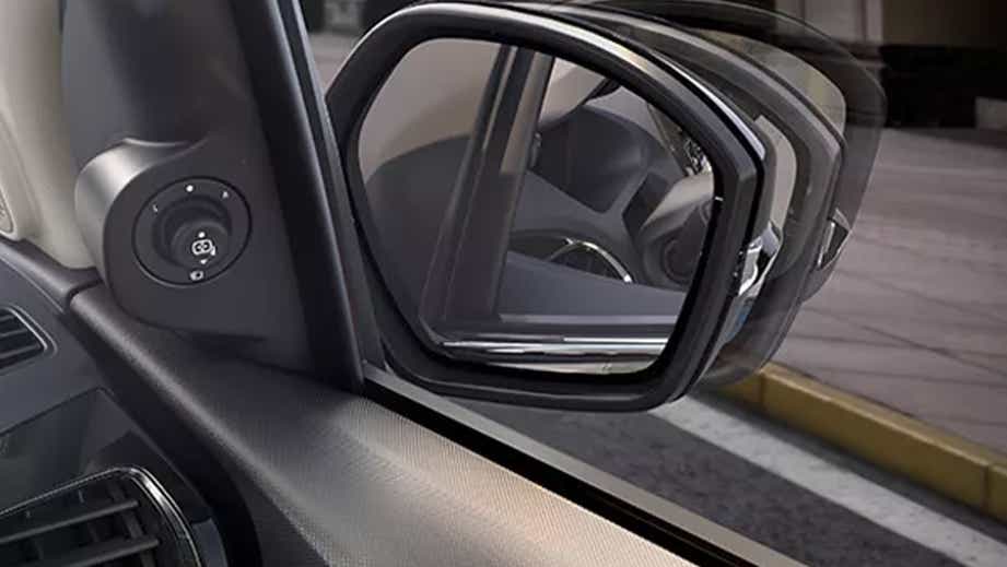 Power adjustable side mirror of a Tata Tiago