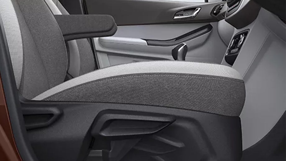 Front seat and armrest view of a Tata Tigor
