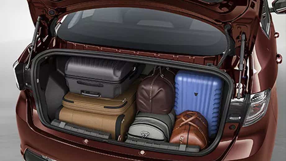 Open boot space with luggage of a Tata Tigor