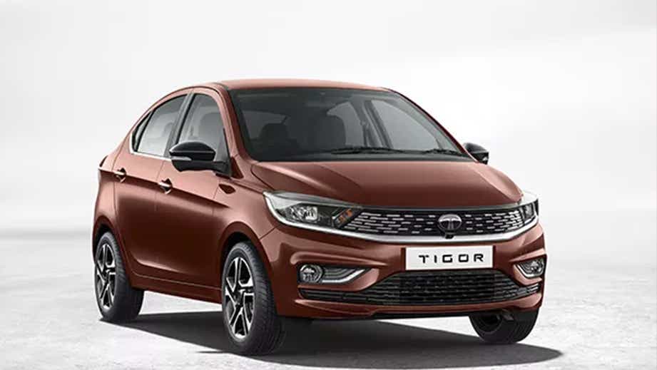 front three-quarter view of a Supernova Copper Tata Tigor