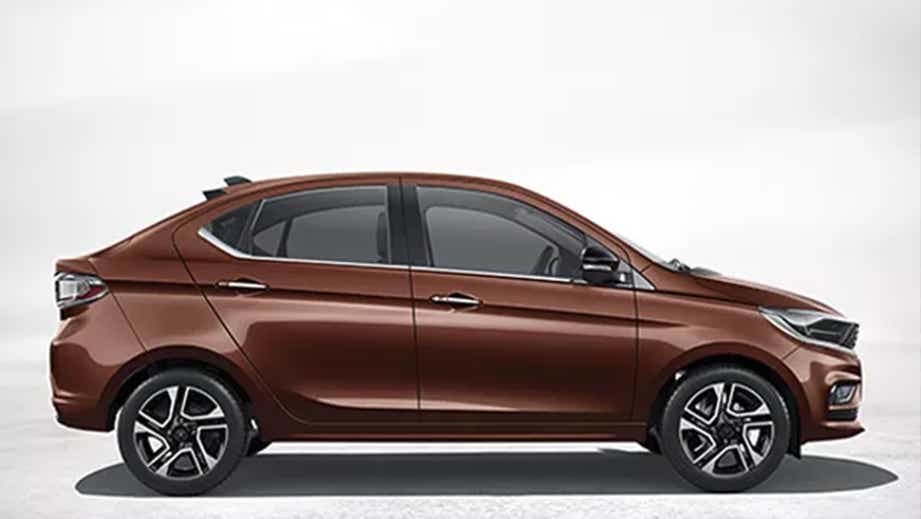 side view of a Supernova Copper Tata Tigor