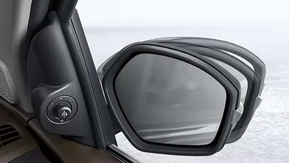 Side mirror close-up of a Tata Tigor