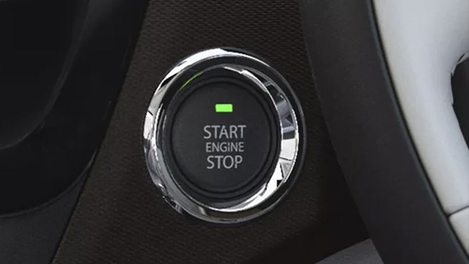Close-up of engine start-stop button in a Tata Tigor