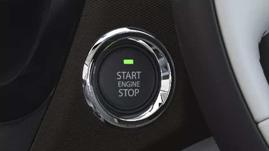 Close-up of engine start-stop button in a Tata Tigor