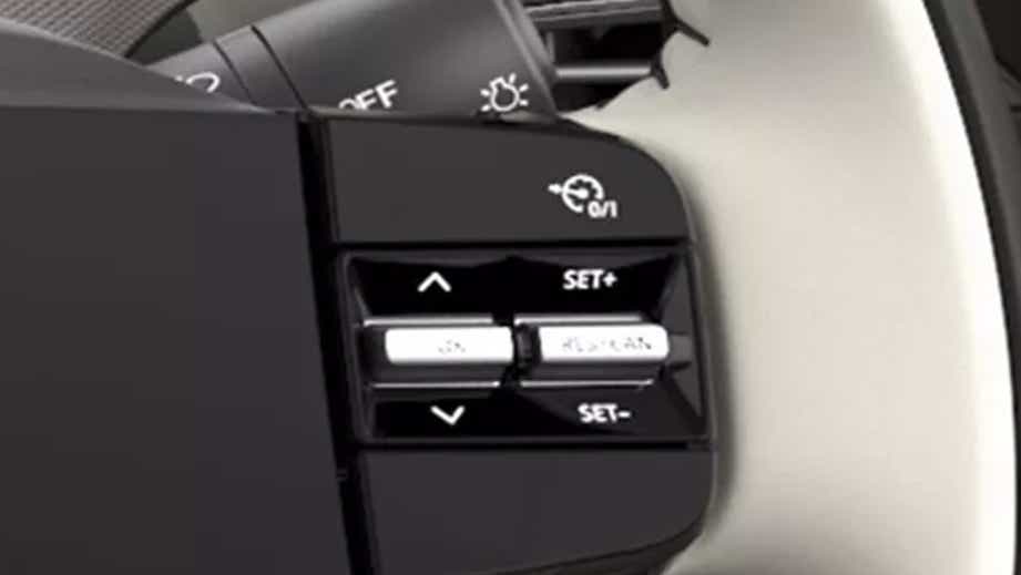 Steering wheel cruise control buttons of a Tata Tigor