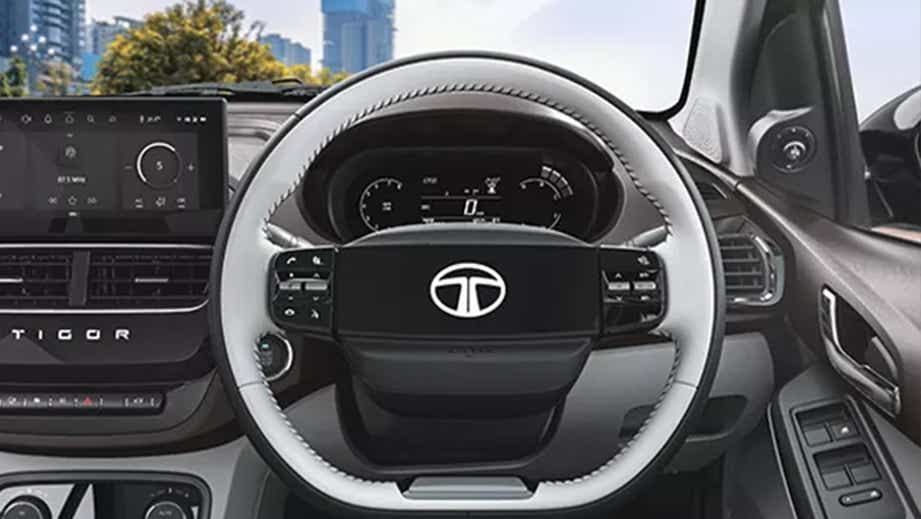 Interior dashboard and steering wheel of a Tata Tigor
