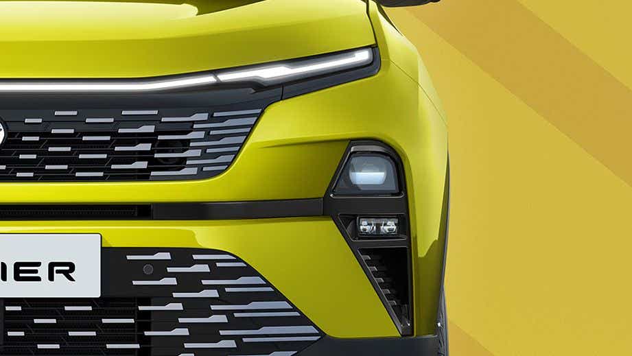 Front headlight and grille close-up of a Tata Harrier