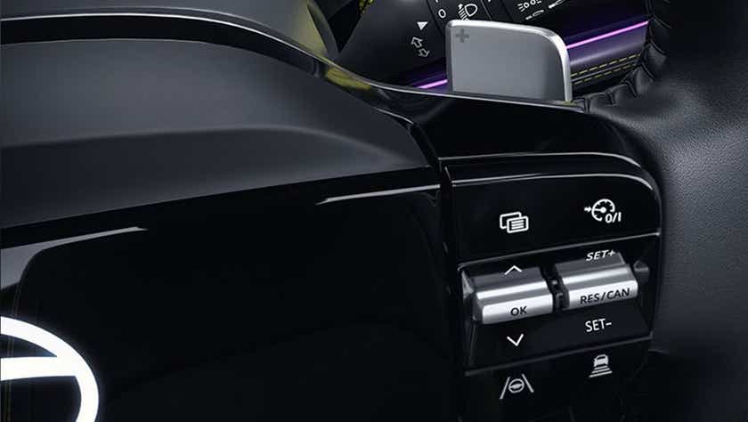 Steering wheel controls and paddle shifter of a Tata Harrier