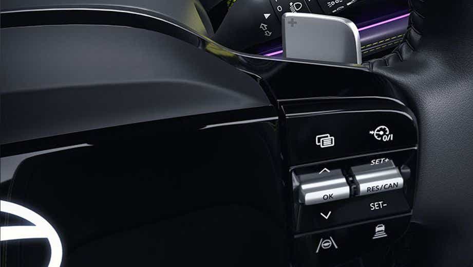 Steering wheel controls and paddle shifter of a Tata Harrier