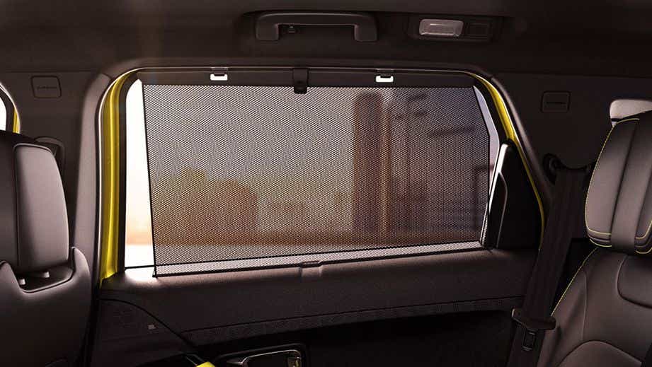 Rear-seat window sunshade view of a Tata Harrier