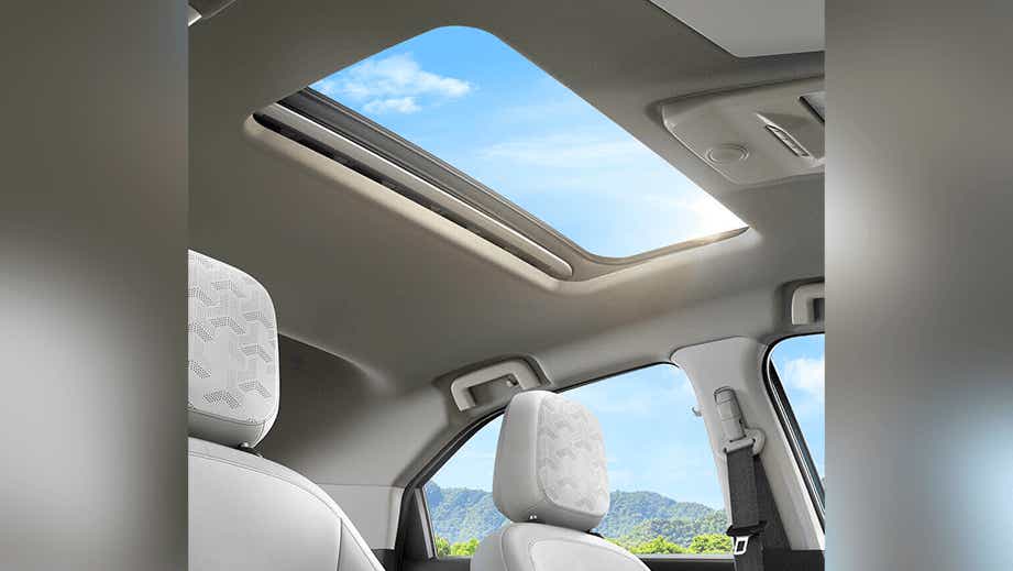 sunroof and front seats view of a Tata Nexon EV Prime