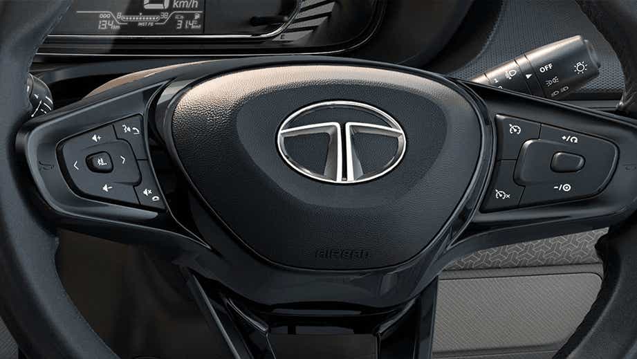 Steering wheel and controls of a Tata Nexon 2017-2023