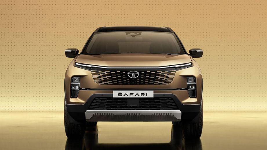 Front view of a Cosmic Gold Tata Safari