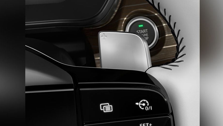 Steering wheel paddle shifter and controls of a Tata Safari