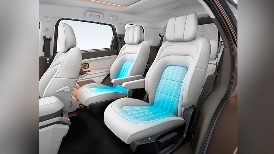interior view showing the front and middle seats of a Tata Safari