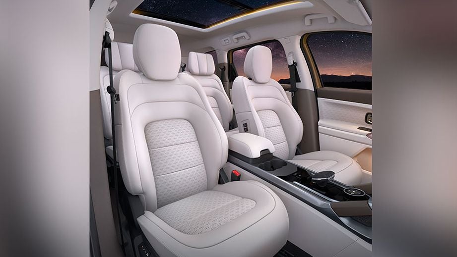 interior front seats and dashboard of a Tata Safari