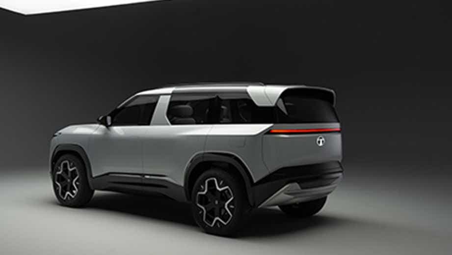 rear three-quarter of a Stardust Ash Tata Sierra EV