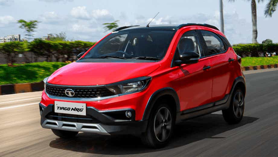 front three-quarter view of a Fire Red Tata Tiago NRG
