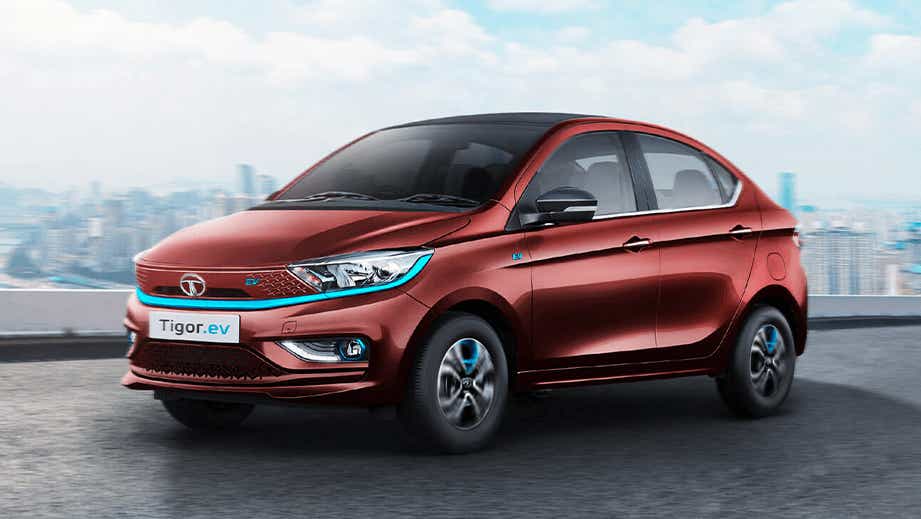 front three-quarter of a Magnetic Red Tata Tigor EV