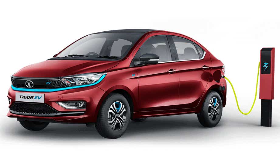 front three-quarter view of a Magnetic Red Tata Tigor EV
