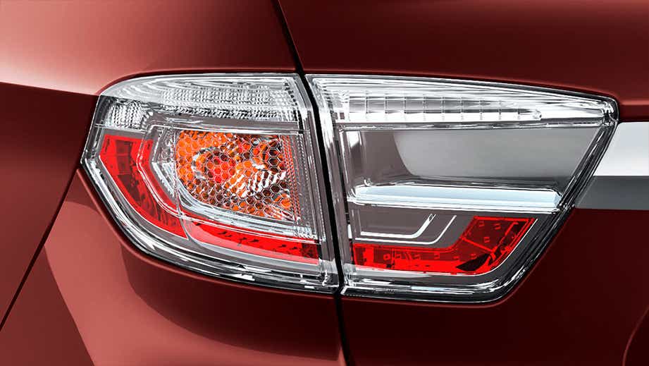 Tail light close-up of a Magnetic Red Tata Tigor EV