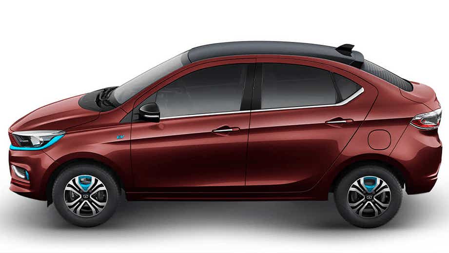 side view of a Magnetic Red Tata Tigor EV