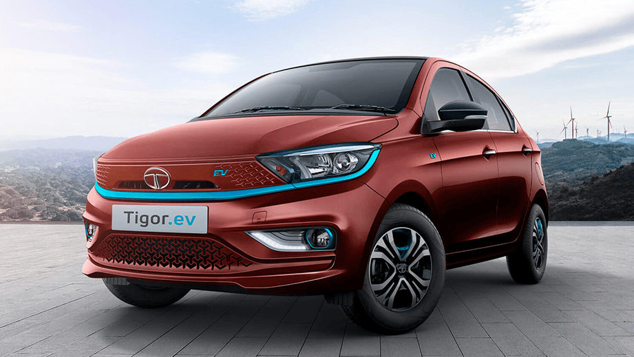 front three-quarter view of a Magnetic Red Tata Tigor EV