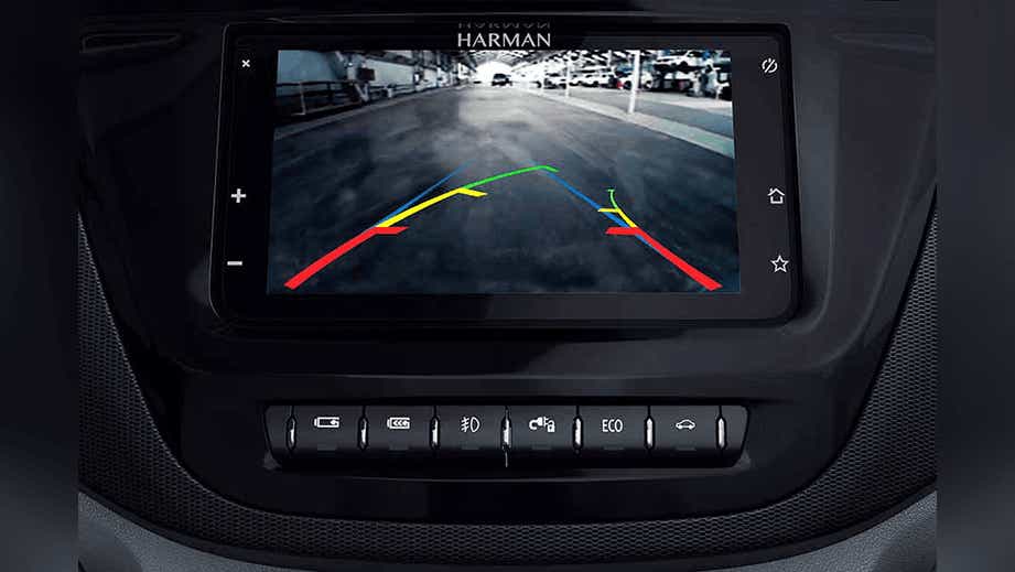 reverse camera screen and dashboard controls of a Tata Tigor EV