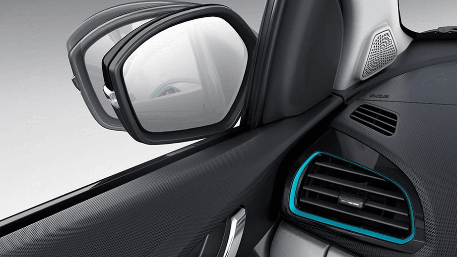 Front interior door panel and side mirror of a Tata Tigor EV