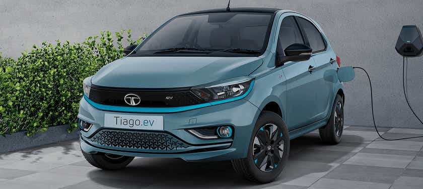 front three-quarter of a Teal Blue Tata Tiago EV
