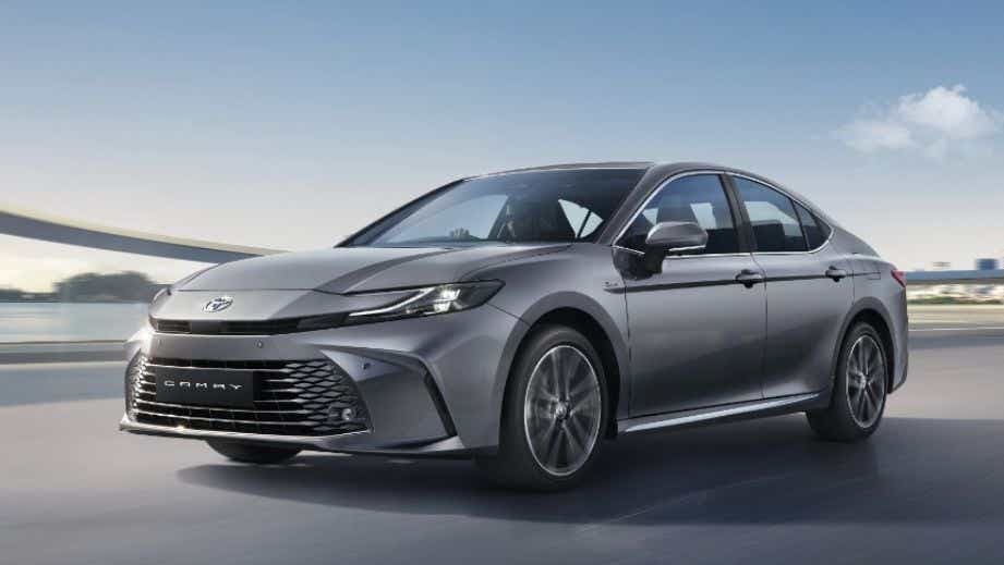 front three-quarter view of a Cement Grey Toyota Camry