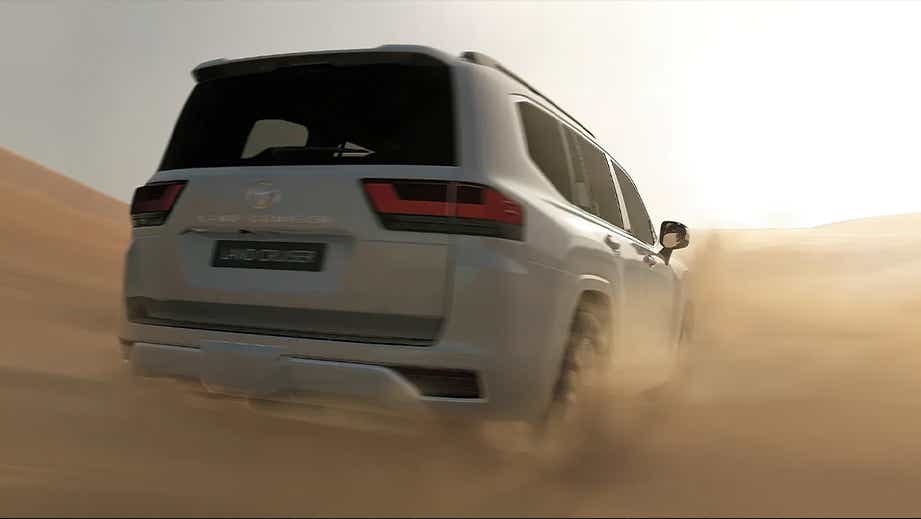 rear view of a Precious White Pearl Toyota Land Cruiser 300