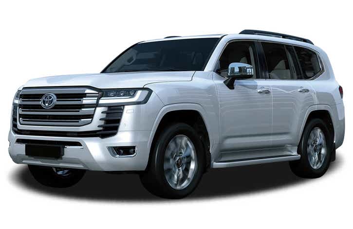 front three-quarter view of a Precious White Pearl Toyota Land Cruiser 300