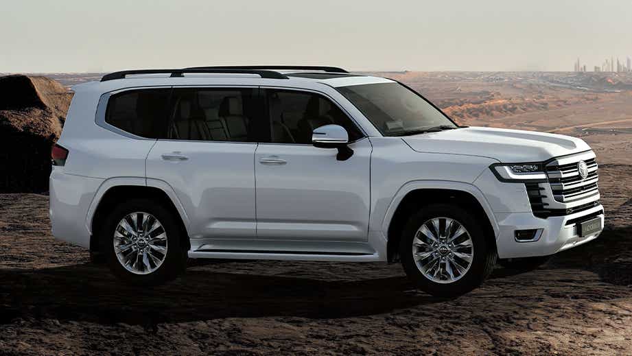 side view of a Precious White Pearl Toyota Land Cruiser 300