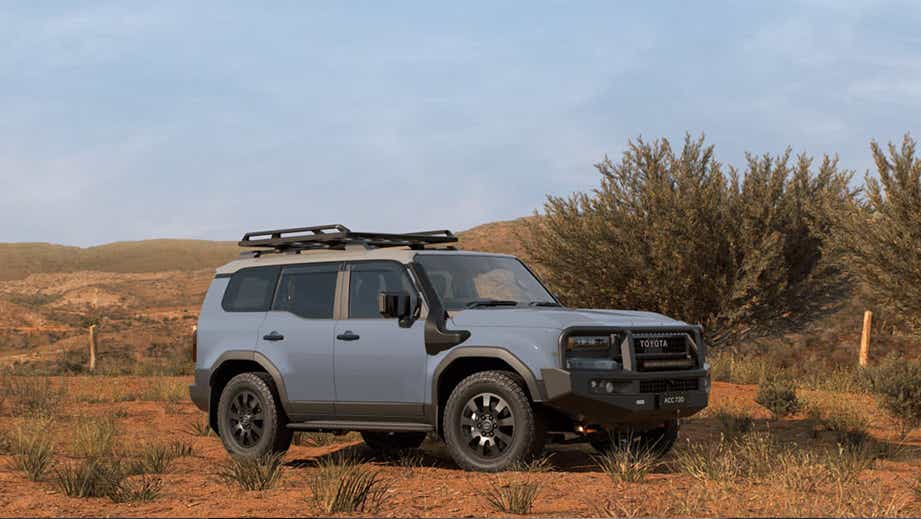 side view of a Toyota Land Cruiser Prado in the outdoors