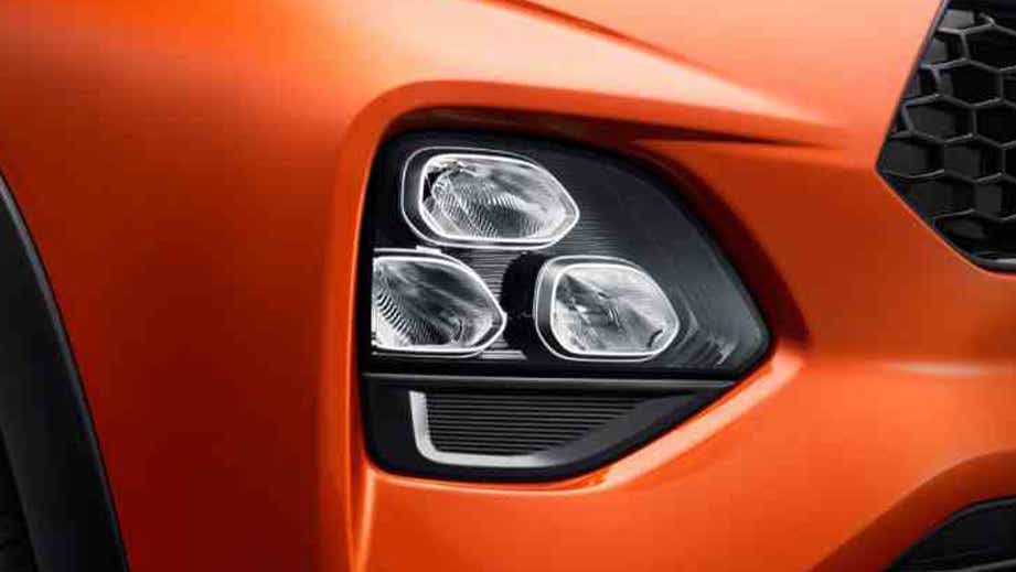 Headlight close-up of a Toyota Urban Cruiser Taisor