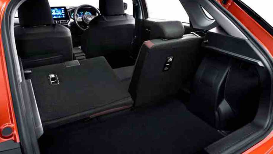 Rear interior view of a Toyota Urban Cruiser Taisor with folded seats