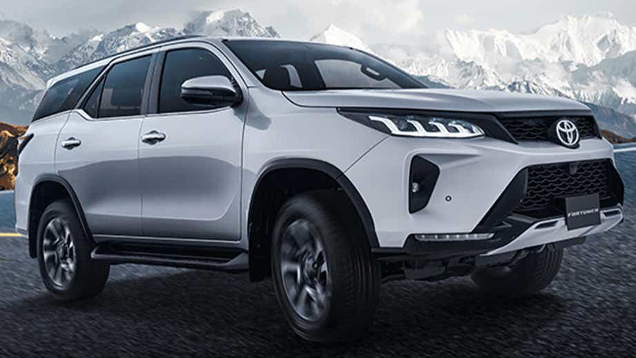 front three-quarter of a Platinum White Pearl Toyota Fortuner Legender